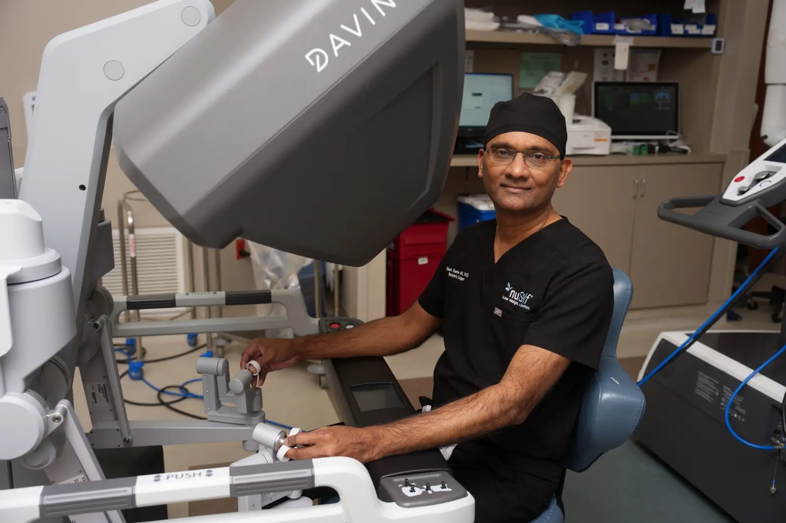 Dr. Sashidhar Ganta at a robotic surgical console