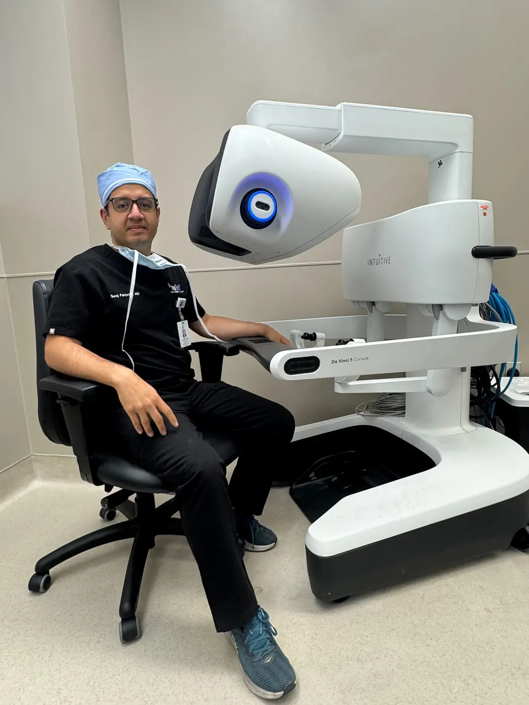 Dr. Suraj Panjwani in a clinical surgical setting