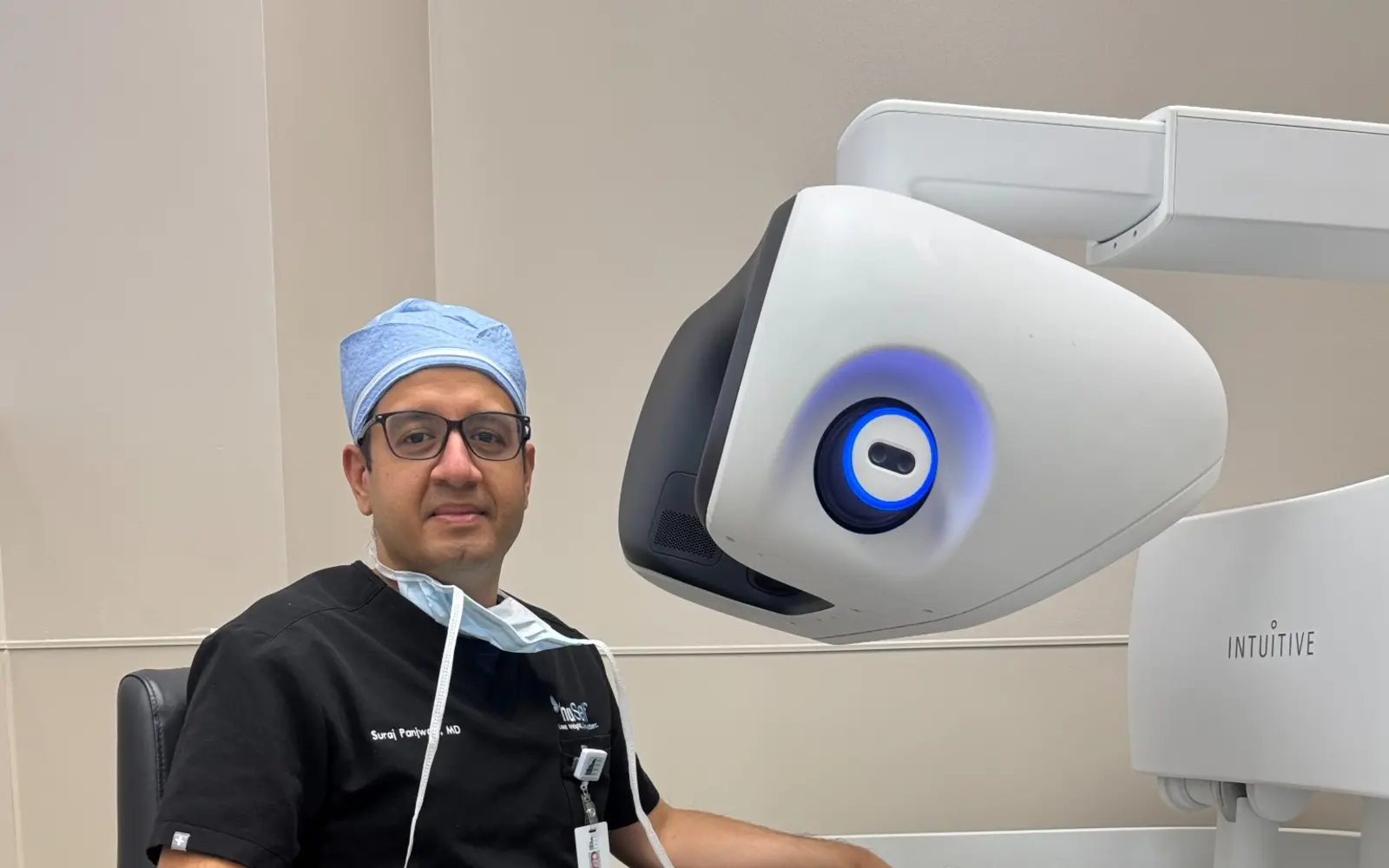 Dr. Suraj Panjwani at the da Vinci 5 robotic surgical console